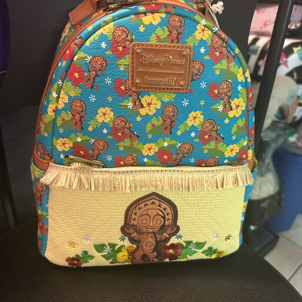 Loungefly Blue and Yellow Backpack with Floral Design
